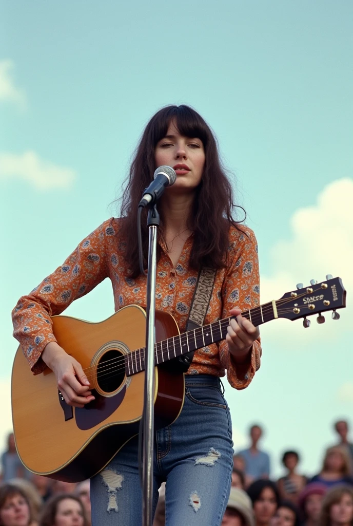 The time was the 1969 Woodstock Free Outdoor Festival venue.、A very beautiful and glamorous 30-year-old white female folk singer、She was performing alone on stage in front of a crowd of 100,000 hippies, playing a worn-out Gibson acoustic guitar and a harmonica holder around her neck, simultaneously in front of a microphone stand.、Paisley psychedelic hippie shirtをジーパンから出してだらしなく着ている、Tattered patchwork denim bell bottoms and hippie sandals、she has a dark brunette One-length Perfectly straight very long hair,Super Beauty、Love & Peace Festival、White clouds in blue sky、A moving and soulful performance、Hippie Accessories、Lots of music equipment on stage、Very glamorous figure、Very large, pendulous breasts、a perfect glamorous mature woman's proportions、The cleavage of large, sagging breasts、Live snap of wide shots with amazing angles by professional photographers、Paisley psychedelic hippie shirtの裾をジーンズから出しているだらしない服装、Super big breasts、Super Beauty、Full Body、Her whole body、Paisley psychedelic hippie shirt、
