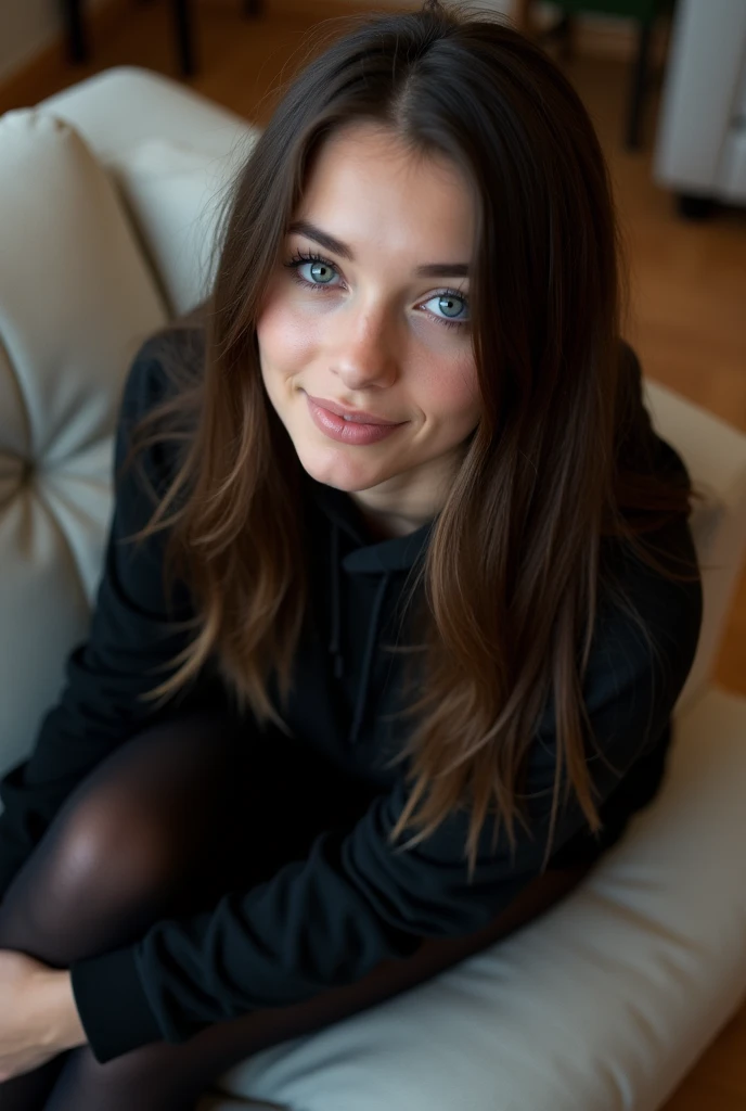 dark brown hair、straight hair、full body 、teaing smile、 she wears a black hoodie.、black pantyhose、adult german woman、blue eyes、showing her legs 、lying down on a couch、young german woman、wide angle、 she has ocean blue eyes.、