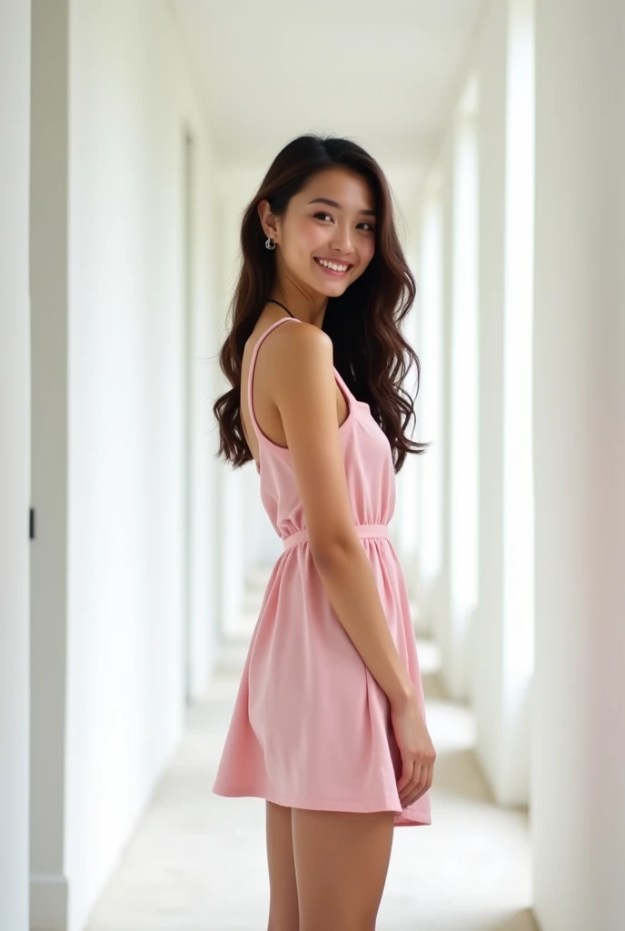 brunette, long hair, smile, flat chest, skinny face, white wall, no decoration, short pink dress, looking at camera smiling, standing in white hallway, photo from behind, wearing high heel boots
