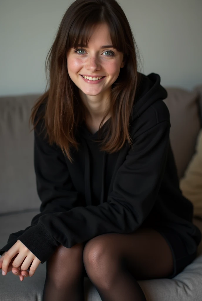 dark brown hair、straight hair、full body 、teaing smile、 she wears a black hoodie.、black pantyhose、adult german woman、blue eyes、showing her legs 、lays on a couch、young german woman、wide angle、 she has blue eyes.、