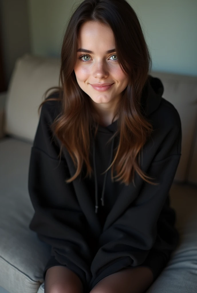 dark brown hair、straight hair、full body 、teaing smile、 she wears a black hoodie.、black pantyhose、adult german woman、blue eyes 、lays on a couch、young german woman、wide angle、 she has  blue eyes.、