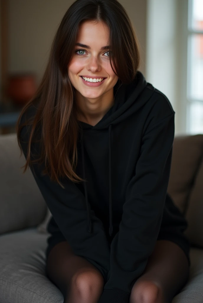 dark brown hair、straight hair、full body 、teaing smile、 she wears a black hoodie.、black pantyhose、adult german woman、blue eyes 、leaning on a couch、young german woman、wide angle、 she has  blue eyes.、