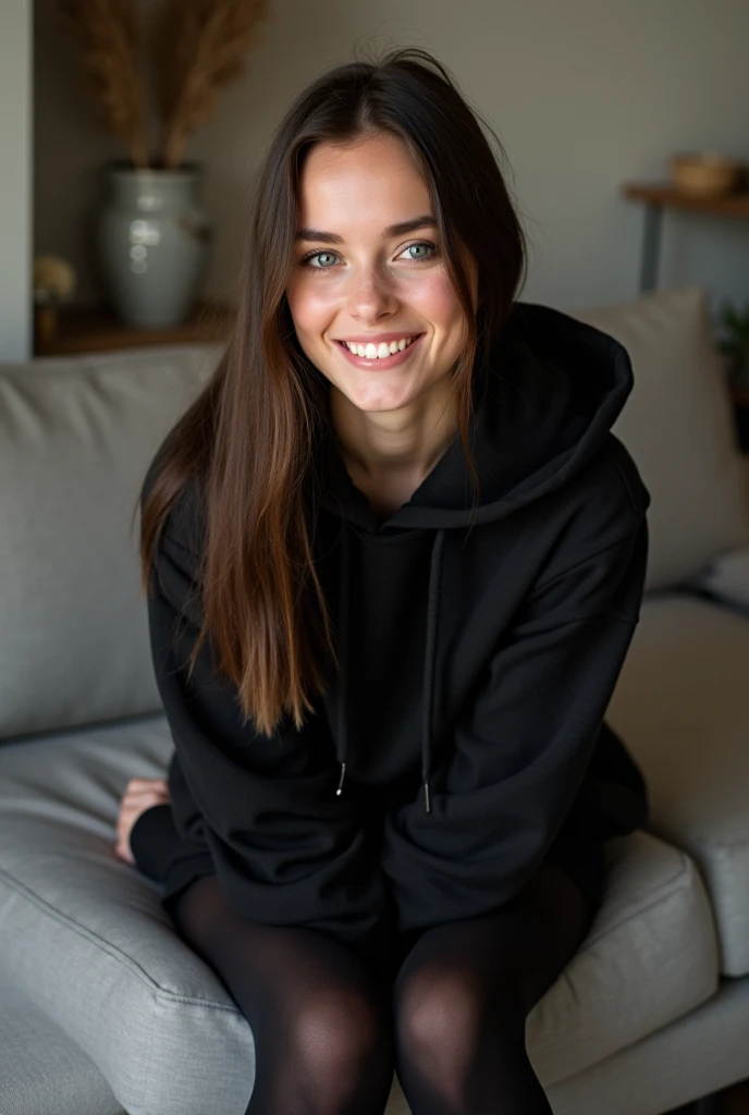 dark brown hair、straight hair、full body 、teaing smile、 she wears a black hoodie.、black pantyhose with white tennis-socks、adult german woman、blue eyes 、leaning on a couch、showing her legs and feet、young german woman、wide angle、 she has blue eyes.、