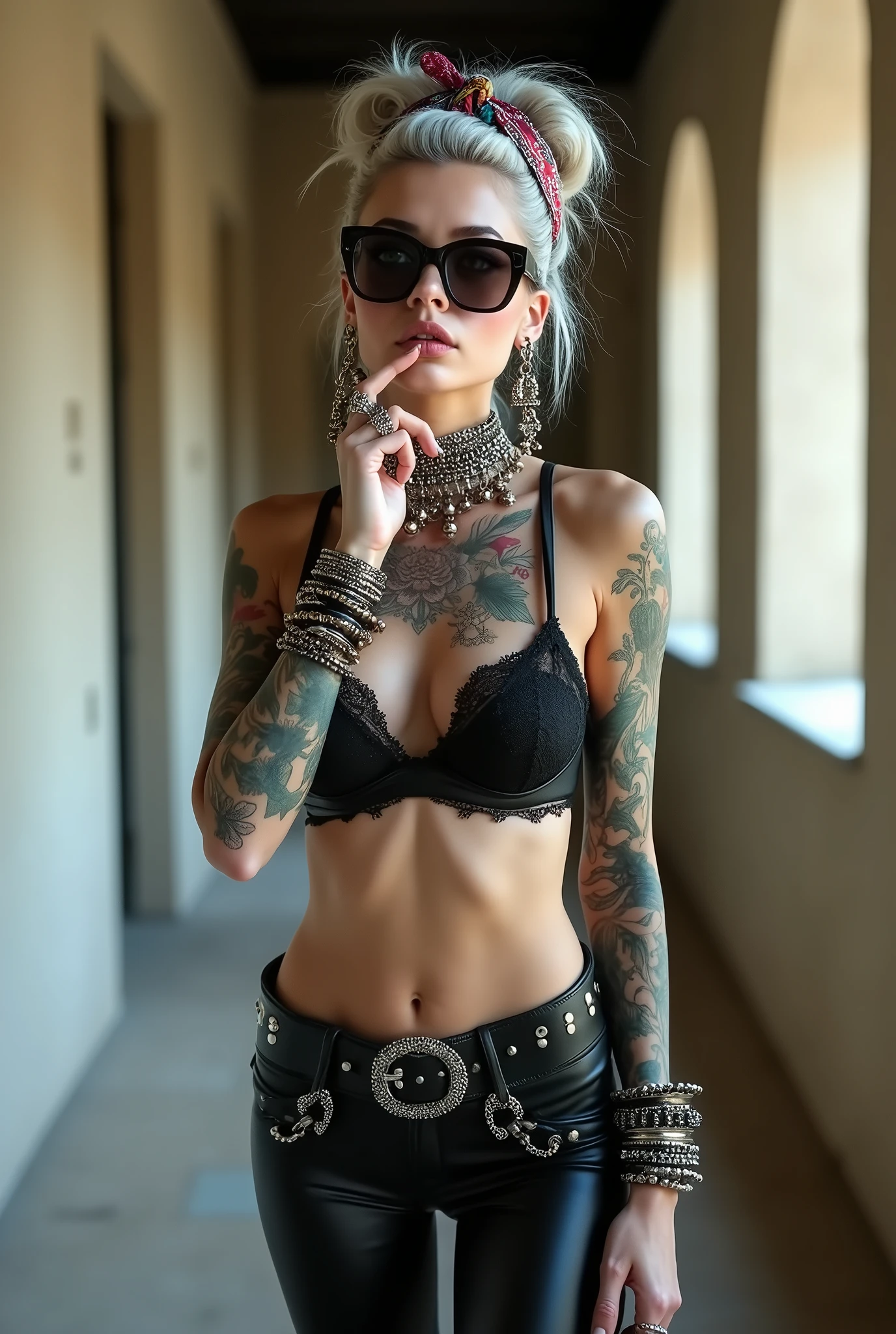 russian milf woman,  grey hair (bouffant, top bun) and oversized square sunglasses and wide  colourful bandana as headband, with very light green eyes, extremely pale. Big lips.  Black lace push up bra, silicone breast,, skintight shiny black leggings. Flip flops. Lots of thick wide studded bracelets, chain collars and big rings,. Two loose studded belts,. Long earrings with chains and feathers. Standing with legs apart,  one hand hands on her hip, the other, sucking her thumb, stretching her neck and looking up in surprise, craving., Neck, chest, stomach and wrists heavily tattoed. Toned abdominals, thin neck, slim legs and thin arms. Narrow hips. At a long narrow corridor.