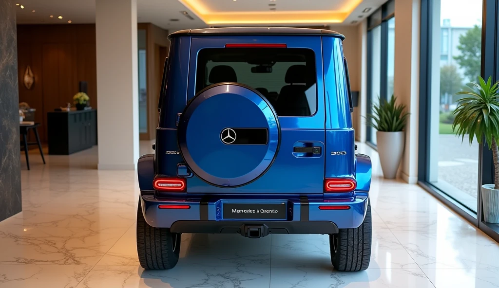 A rear-angle view of the luxurious New 2025 Mercedes-Benz Baby G-class in a sleek blue color, parked in an upscale showroom. The vehicle’s iconic boxy shape is emphasized by the sharp lines and bold contours, with the deep blue finish adding an air of sophistication. The angle highlights the stylish rear design, including the sleek taillights and spare tire cover, reflecting the Baby G-class’s rugged yet refined character. The showroom features polished marble floors, expansive glass walls, and elegant decor, all bathed in refined lighting that accentuates the vehicle’s premium details. The Mercedes-Benz Baby G-class stands out as a beacon of luxury and power in this opulent environment.