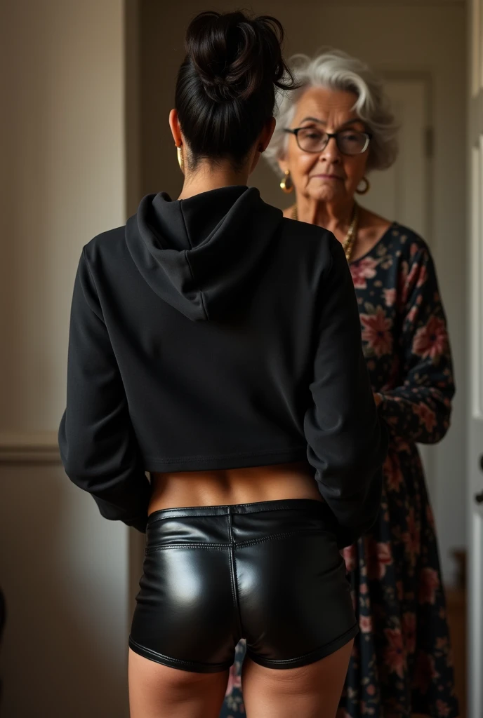 black woman hair in a bun black hoodie black leather short shorts being fucked in the ass by a old grandma in a dress