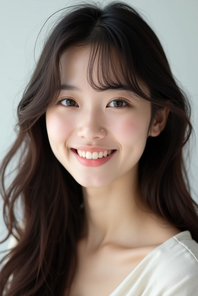 Face of an Asian woman with soft wavy bangs and dark brown hair。Her hair is long and layered.、In the flowing soft waves、Give a friendly and approachable impression。Background is white。Early 20s。