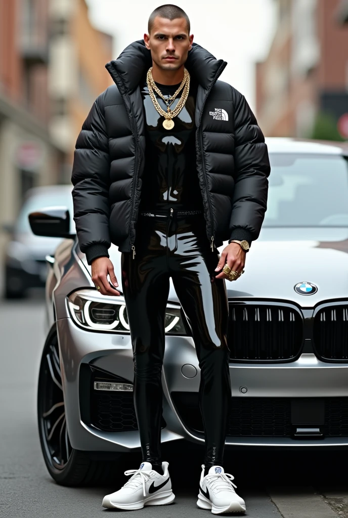 full view full body, white guy with light-brown undercut clean shaved haircut, golden rings, necklaces, wearing full length shiny skintight rubber grass with a black North Face puffer jacket blistered with air and white Nike TN trainers, waiting standing beside bmw car 