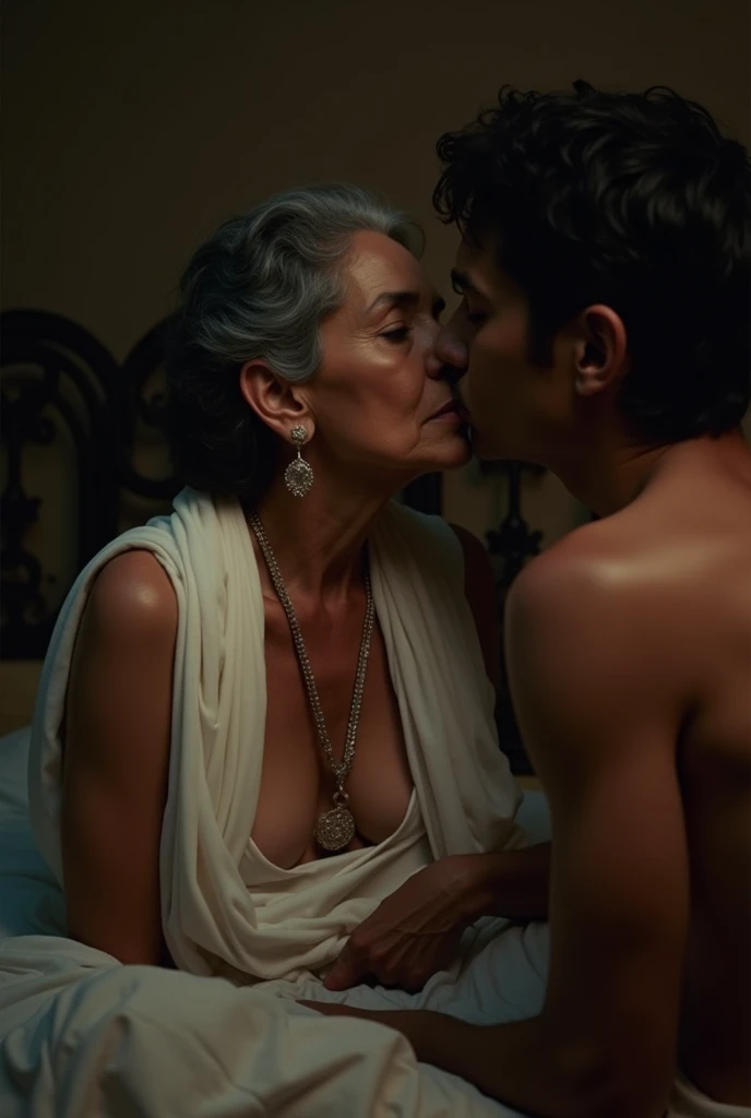 photo of Beautiful Indian Mature Old Aunty, Dark Skin, wearing White stole around her neck, Nude, Breasts Exposed and sitting on Bed, Kissing a Boy, Dim light in the room.