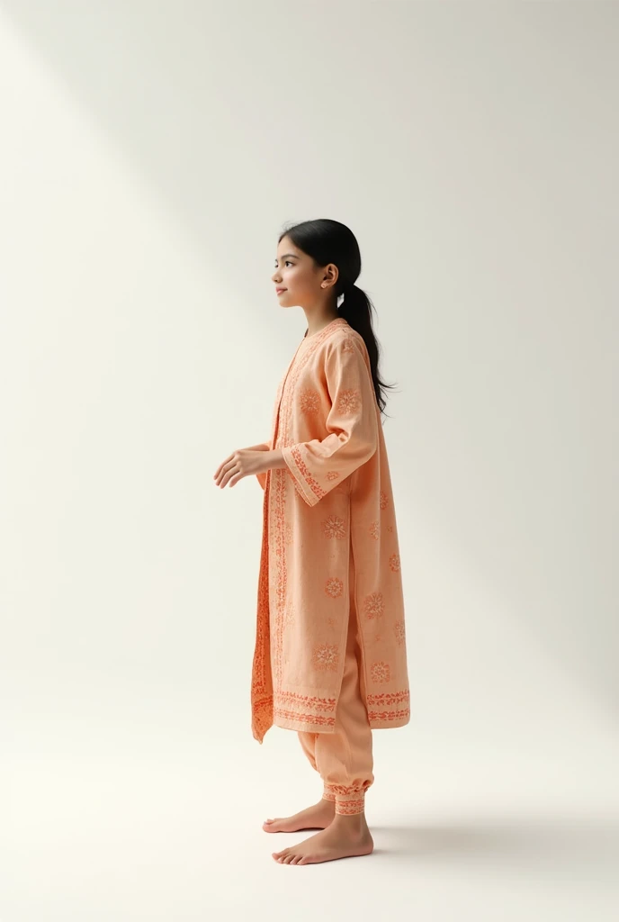 A girl who wear kurta pajama stand and her background is white 
