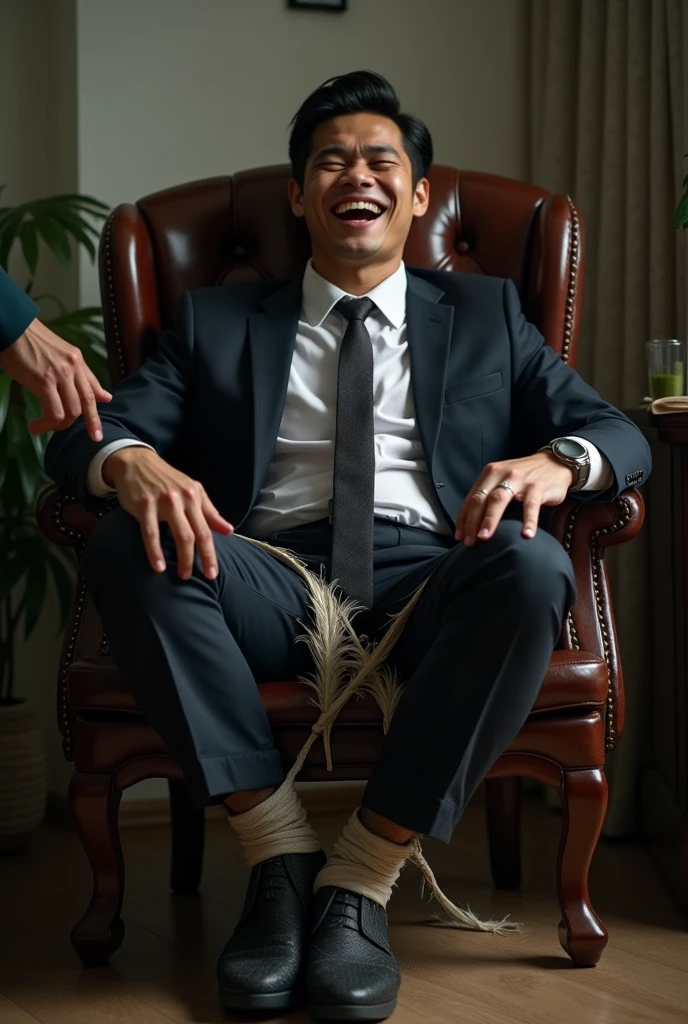 There is a handsome young Malay businessman from Malaysia named Haqiem tangan,legs with black socks tied with ropes to the chair and eyes covered with cloth A man opened Haqiem&#39;s shoes and tickled Haqiem&#39;s soles with chicken feathers Haqiem laughed uncontrollably because his soles were being tickled