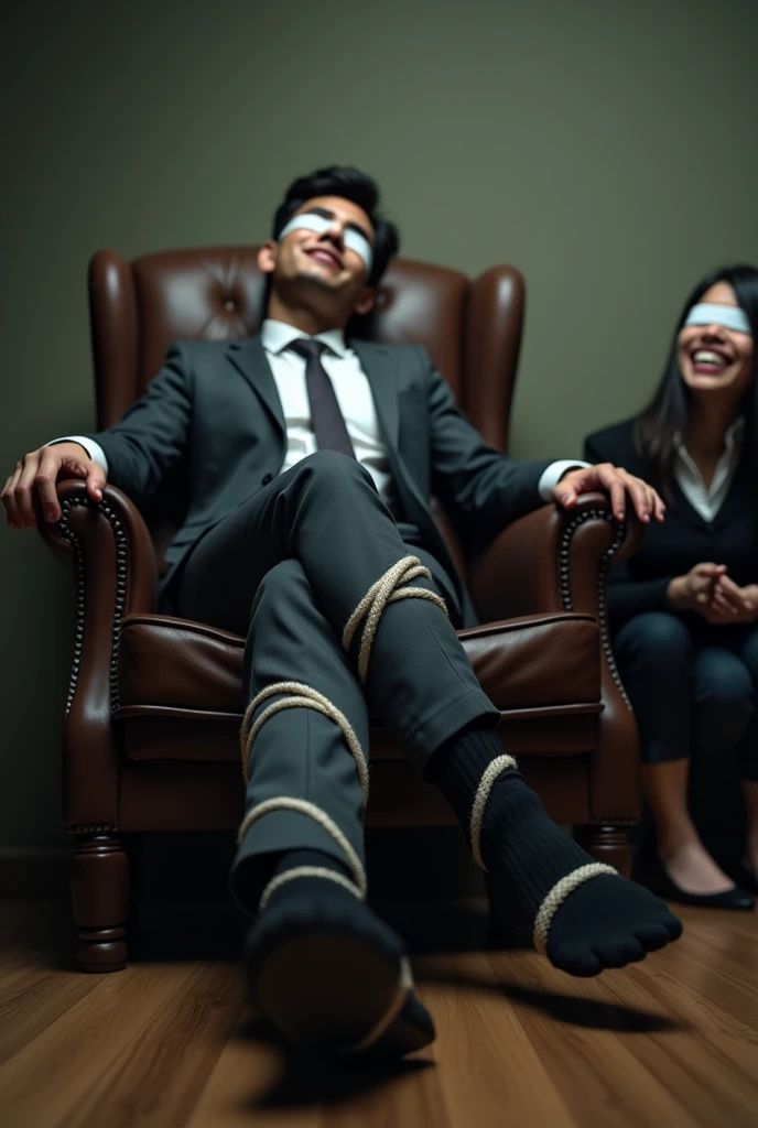 There is a handsome young Malay businessman from Malaysia named Haqiem tangan,legs with black socks tied with ropes to the chair and eyes covered with cloth A man opened Haqiem shoes and tickled Haqiem soles with chicken feathers Haqiem laughed uncontrollably because his soles were being tickled