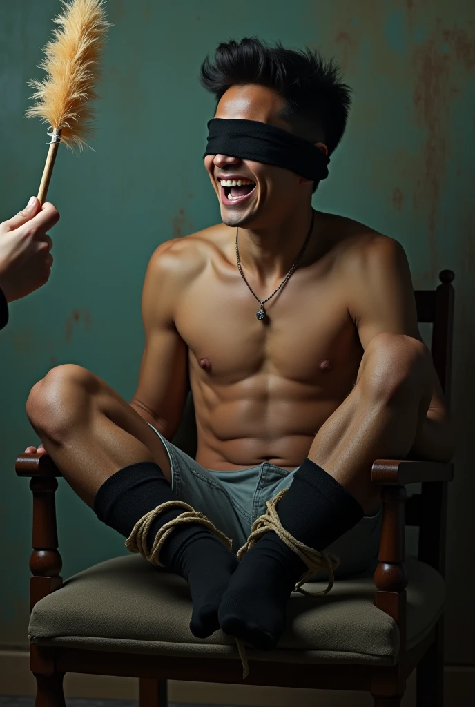 There is a the most handsome student from Malaysia named Haqiem hands,legs with black socks tied with ropes to the chair and eyes covered with cloth
Haqiem laughed uncontrollably because his soles being tickled using feather duster by the man kidnapper