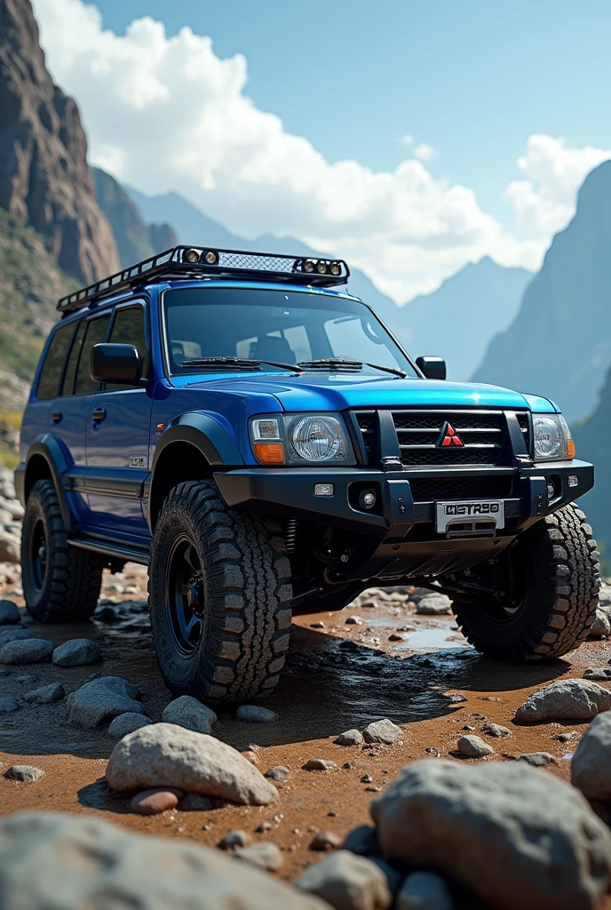 misubishi montero pajero blue with all terrain tires