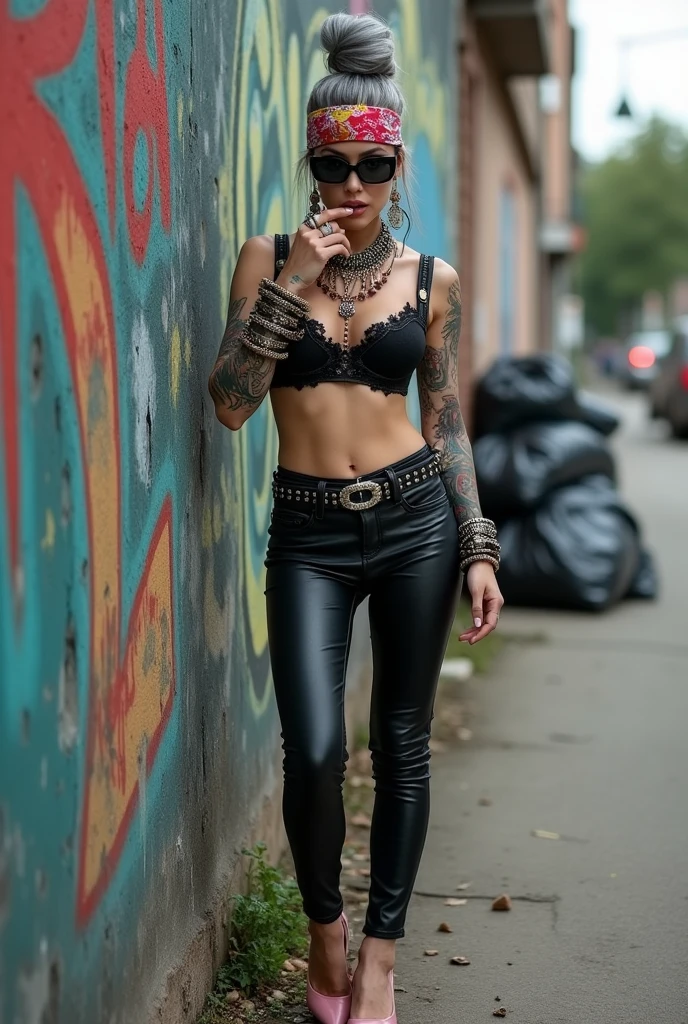 russian milf woman, grey hair (bouffant, top bun) and oversized square sunglasses and wide colourful bandana as headband, with very light green eyes, extremely pale. Big lips. Black lace push up bra, silicone breast,, tight skinny black low rise leather jeans. Light pink high heel mules. Lots of thick wide studded bracelets, chain necklaces and big rings,. Two loose studded belts. Long earrings with chains and feathers. Leaning her back against a graffitied wall, separated legs, touches her lip with one hand and touches her necklaces with the other hand. Chin down in shame, looking down at the ground, Neck, chest, stomach and wrists heavily tattoed. Toned abdominals, thin neck, slim legs and thin arms. Narrow hips. Full body. At a dead end street with graffitied walls, ground littered with waste and piled black plastic garbage bags. Full body, frontal view