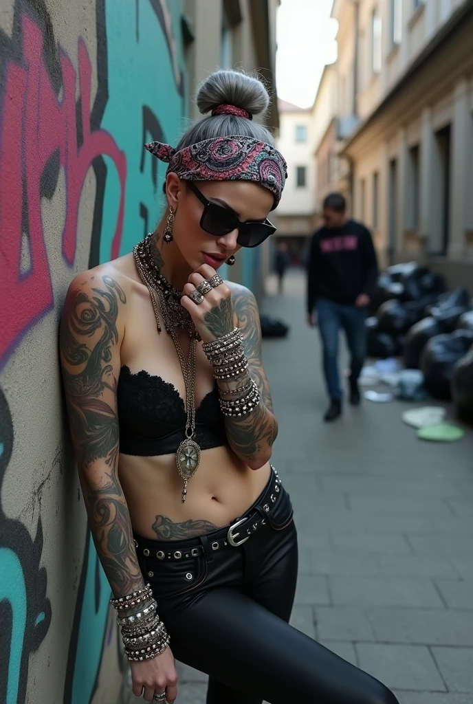 russian milf woman, grey hair (bouffant, top bun) and oversized square sunglasses and wide colourful bandana as headband, with very light green eyes, extremely pale. Big lips. Black lace push up bra, silicone breast,, tight skinny black low rise leather jeans. Light pink high heel mules. Lots of thick wide studded bracelets, chain necklaces and big rings,. Two loose studded belts. Long earrings with chains and feathers. Leaning her back against a graffitied wall, separated legs, touching her lip and neck. Chin down in shame, looking down at the ground, Neck, chest, stomach and wrists heavily tattoed. Toned abdominals, thin neck, slim legs and thin arms. Narrow hips. Full body. At a dead end street with graffitied walls, ground littered with waste and piled black plastic garbage bags. Some men in the background. Full body, frontal view