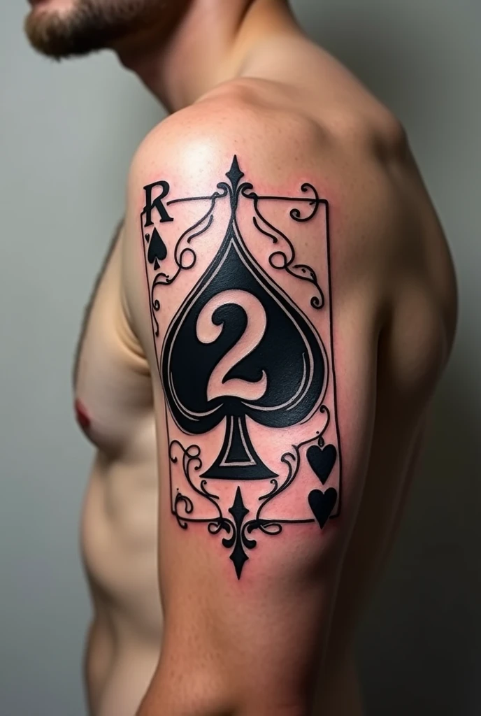 Tattoo with two of spade playing card

