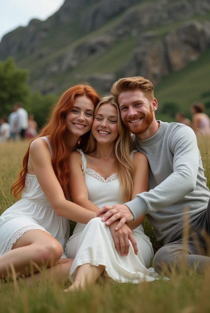 (photorealism:1.2), Candid outdoor photo of three people sitting closely together in a grassy field with a rocky hill in the background. The person on the left is a woman with medium skin tone, long red hair, and is wearing a white dress with lace trim. The person in the middle is a woman with fair skin tone, long blonde hair, and is wearing a white outfit, smiling with her eyes closed. The person on the right is a man with fair skin tone, short red hair, an American buzz cut, a well-defined beard, and is wearing a light gray sweater, smiling with his eyes closed and his arms around the person in the middle. The background includes a few other people and picnic items, suggesting a casual and relaxed atmosphere.