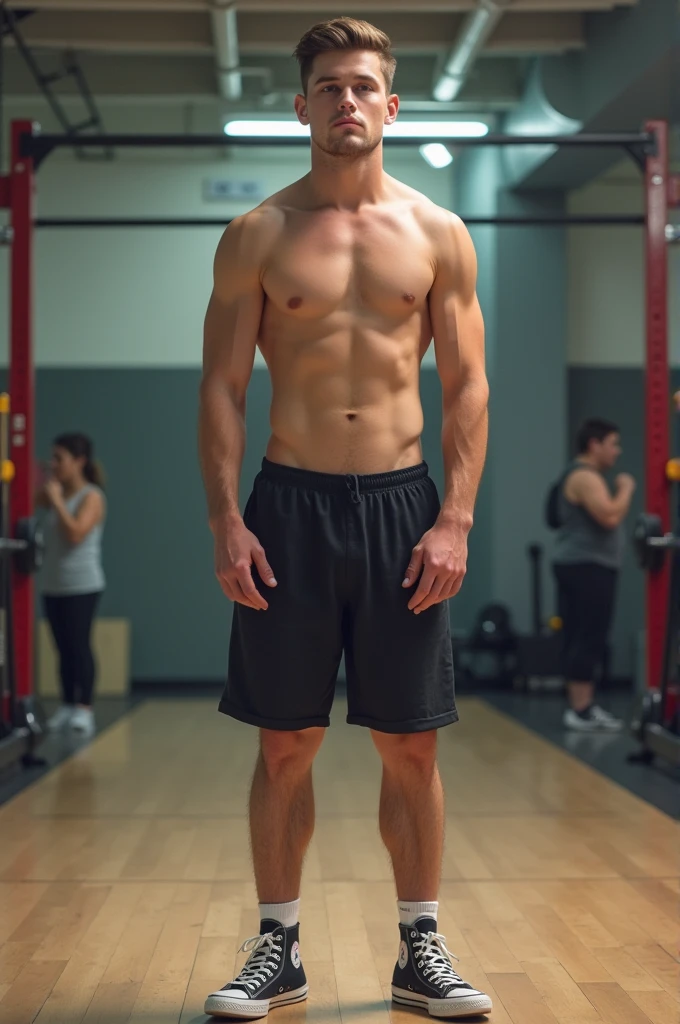 Normal body man, not at all, wearing only a black mid-top converse. He's in the gym. All of us. He has a normal body and short hair..