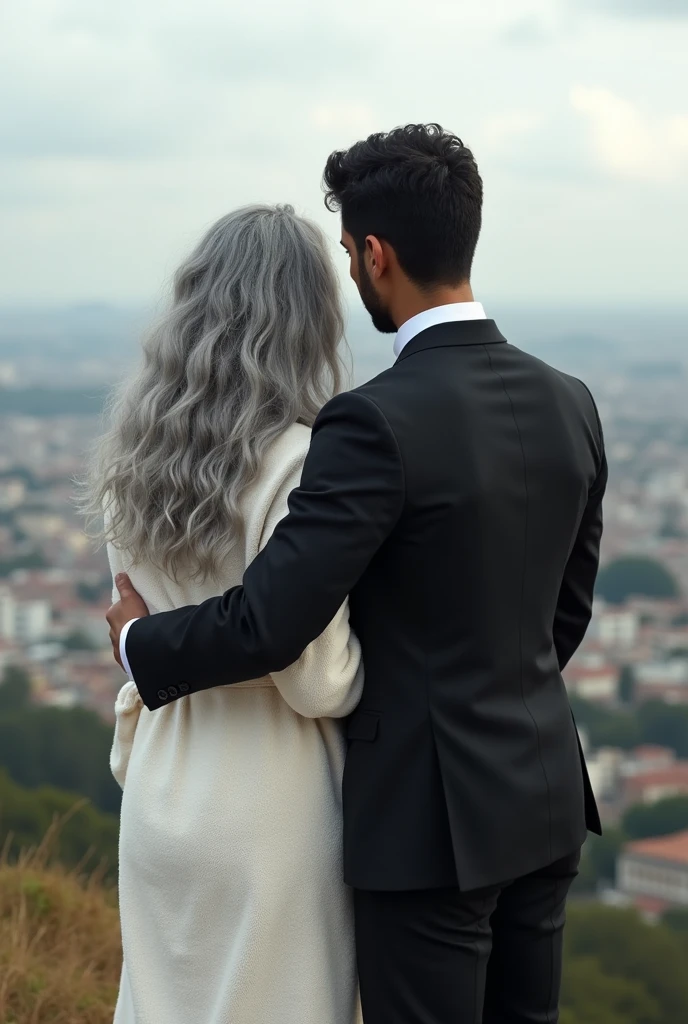 A beautiful youthful looking Hispanic version of a gray haired Selena Gomez as a 50 years old woman with long her completely gray hair in a big curls styles wearing a bathrobe standing on top of a hill overlooking a big city she is overlooking a city with a black haired younger 2 man who looks like Jimmy Donaldson/MrBeast wearing a business suit with short completely black hair he is hugging her