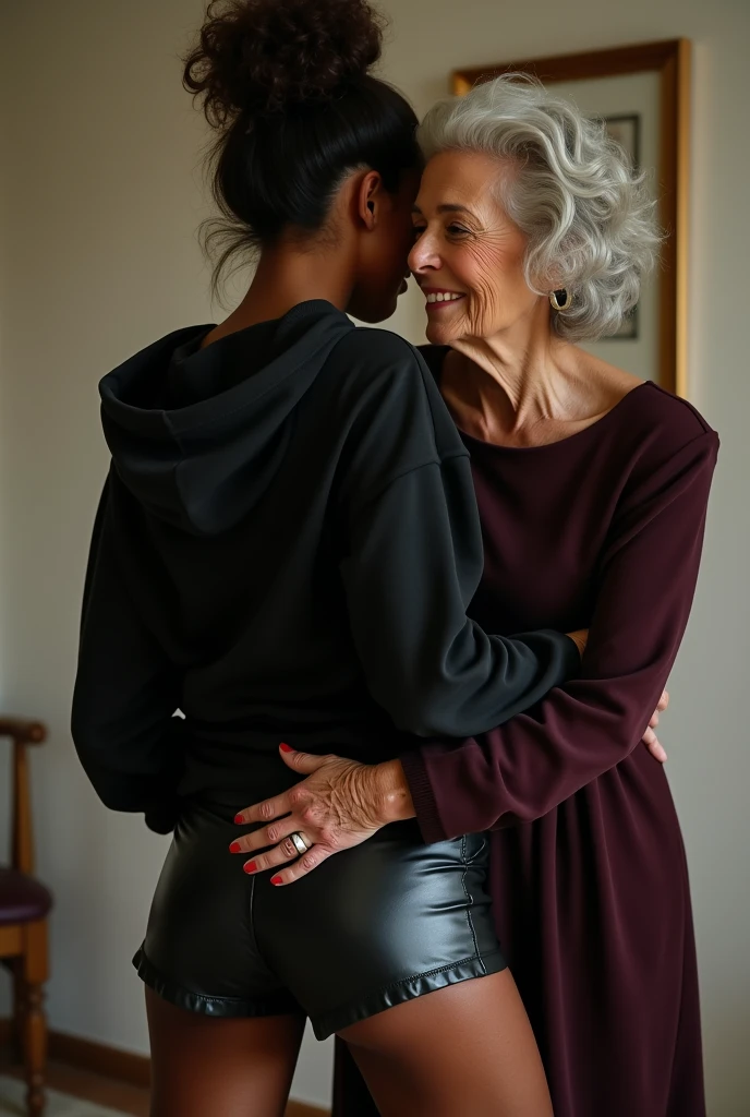 black woman hair in a bun black hoodie black leather short shorts being fucked in the ass by a old grandma in a dress