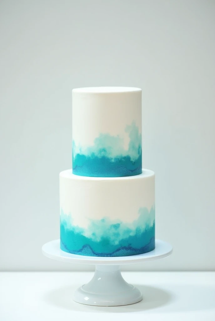 white 2-tier cake brushed with turquoise color on the bases