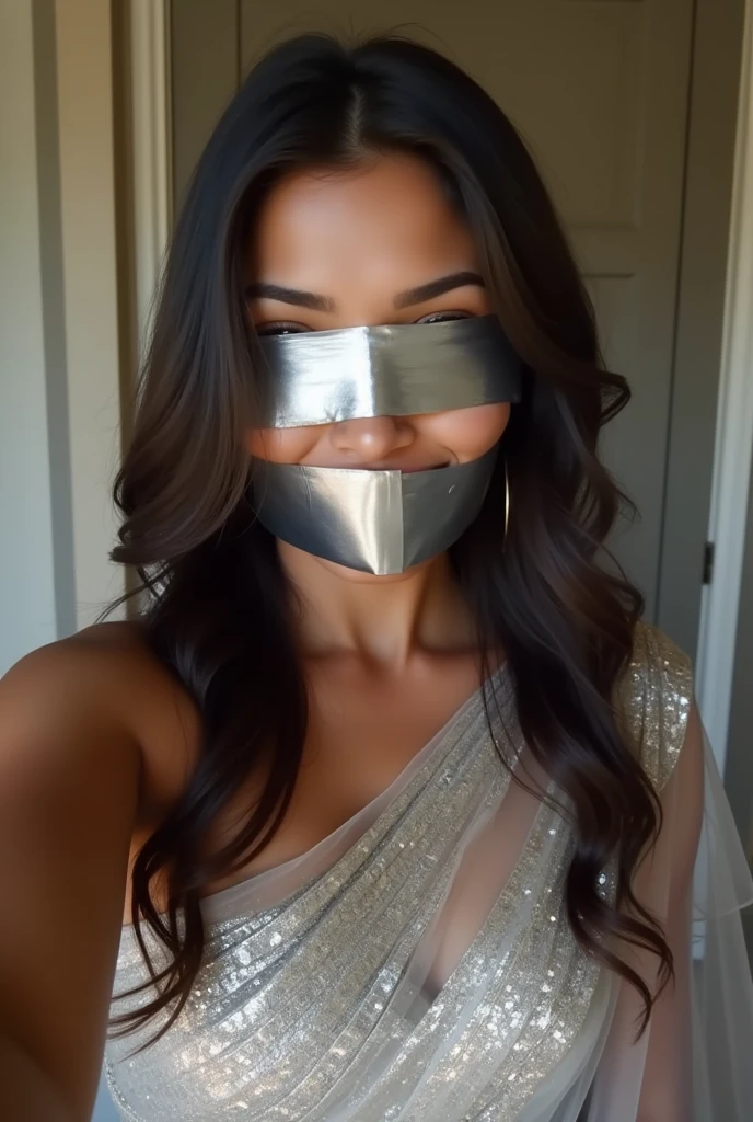 Aesthetic Indian Girl blindfolded Duct tape gagged in sexy silver shimmering prom saree Taking selfie duct tape gagged