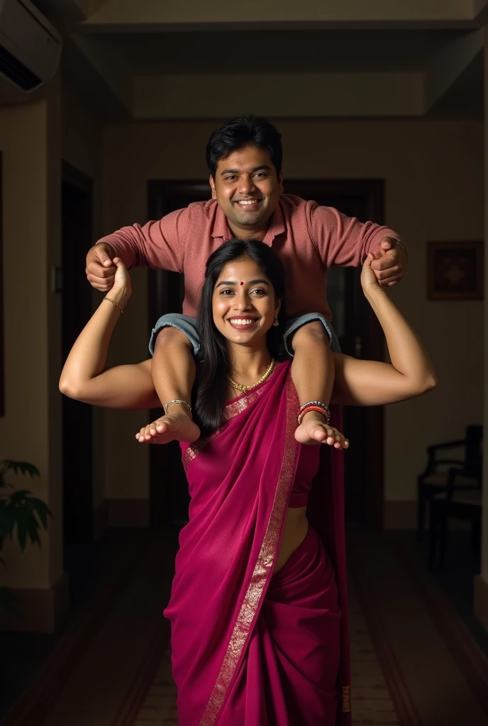 Beautiful and Slim Indian woman in a dark pink silk saree lifting piggyback a large chubby man above her shoulders, man is sitting on woman's shoulders, in a dark room with high ceiling, natural smile, woman is looking into the camera , she is holding his hands, full body image 