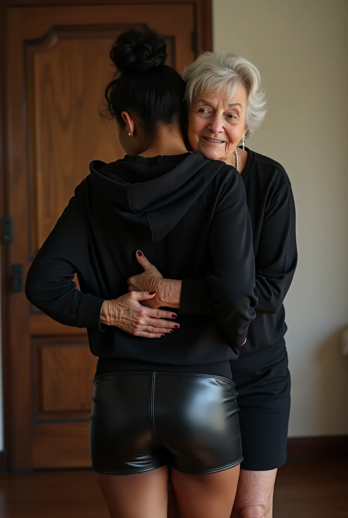 black woman hair in a bun black hoodie black leather short shorts being fucked in the ass by a old grandma in a dress