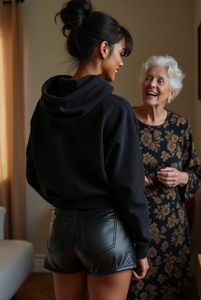 black woman hair in a bun black hoodie black leather short shorts being fucked in the ass by a old grandma in a dress