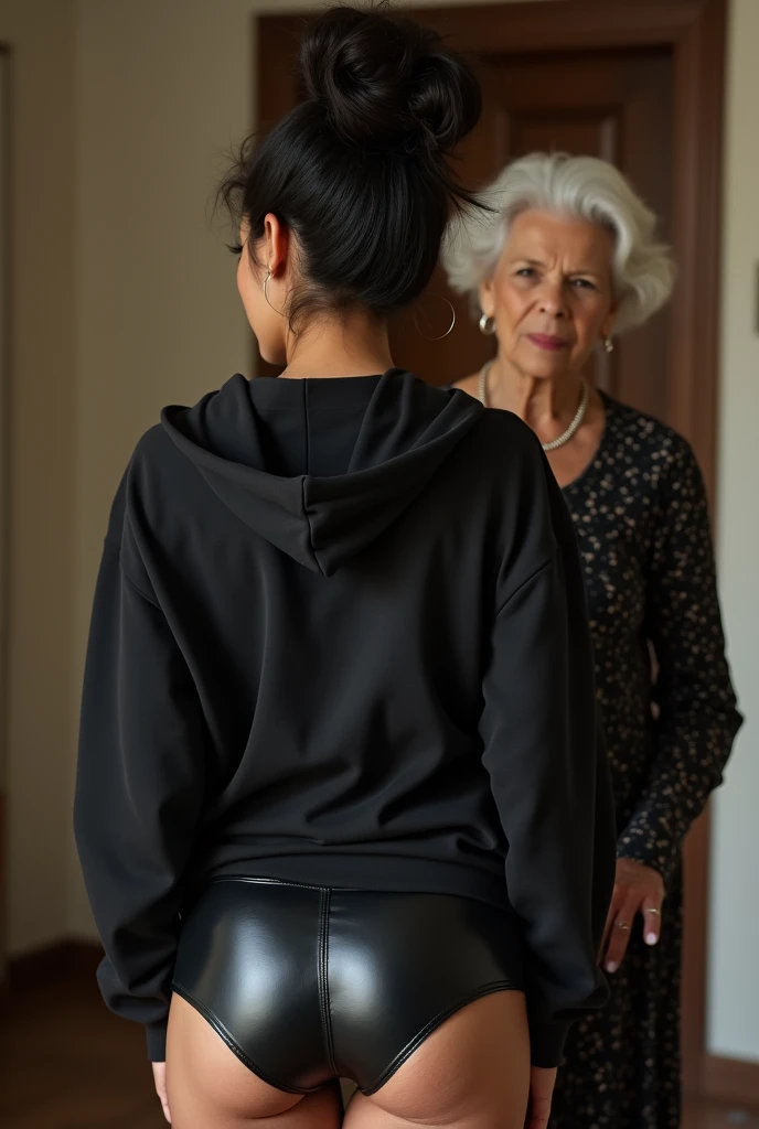 black woman hair in a bun black hoodie black leather short shorts being fucked in the ass by a old grandma in a dress