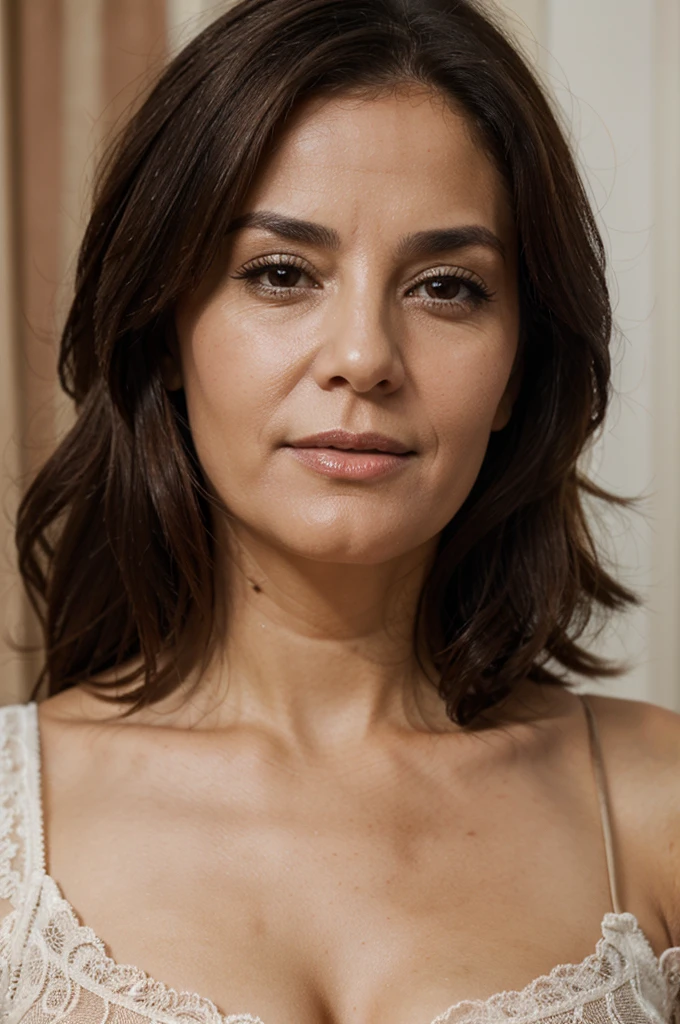 head shot of beautiful 60 year old woman with back to the camera, seductive, looking over her shoulder at the camera, breasts exposed, solid grey background