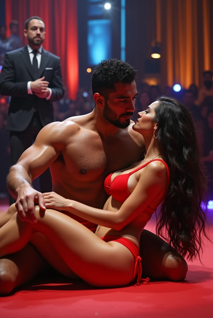 A young Puerto Rican man hairy bearded strong muscular red underwear bulge bulge, lying on the floor over a beautiful woman in red panties lying on the floor who pulls down her underwear, in performance on a stage of a television program presented by a famous presenter.