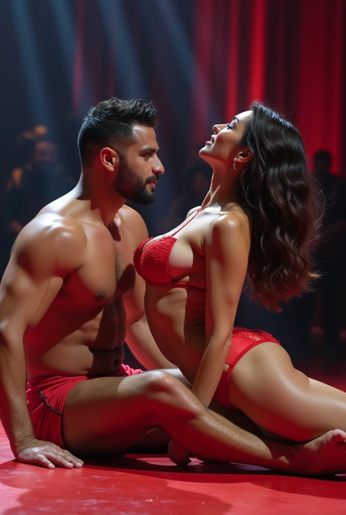 A young Puerto Rican man hairy bearded strong muscular red underwear bulge bulge, lying on the floor naked over a beautiful woman in red panties lying on the floor who pulls down her underwear, in performance on a stage of a television program presented by a famous presenter.