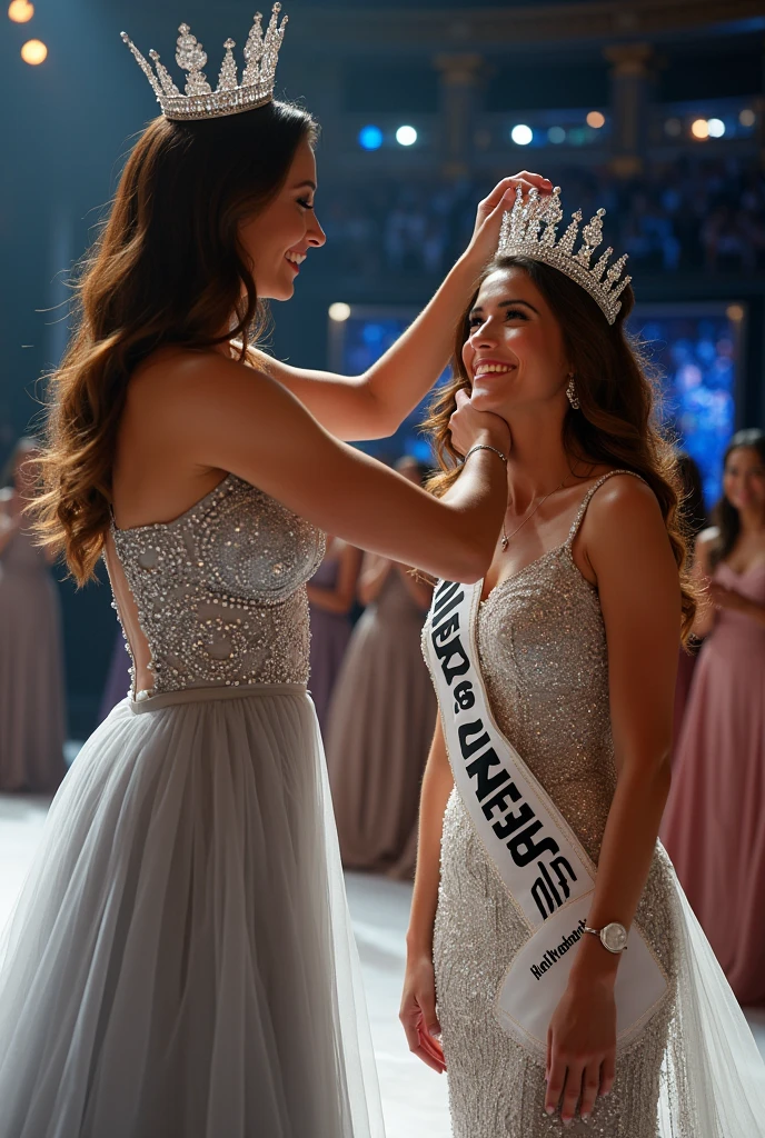 Reigning Miss Universe crowning the new miss Universe. Wear silver long brookat gown. The New Miss Universe is tears when crowning. 