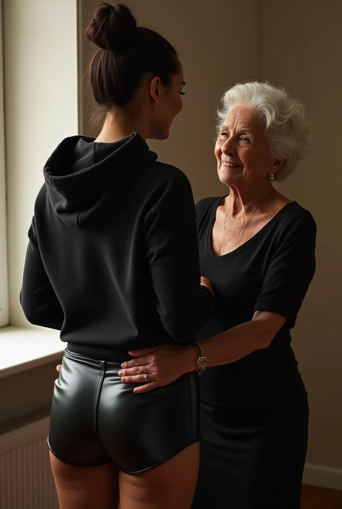 black woman hair in a bun black hoodie black leather short shorts being fucked in the ass by a old grandma in a dress