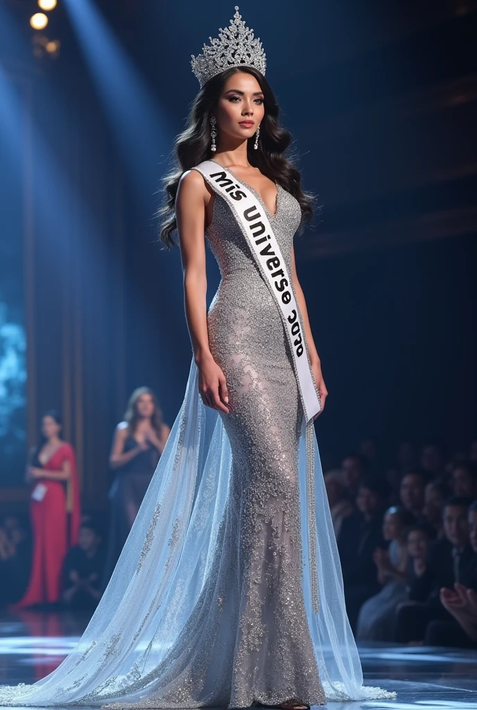 Miss universe, silver long kebaya brookat dress, at miss universe stage, wear crown, elegant, beautiful, 38 C huge boobs, slim, don't smile, sexy vibes. Sharp eyes, cool, bold make up.  Sash Miss Universe 2026
