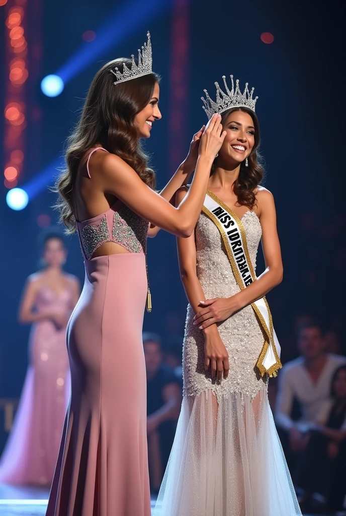 reigning Miss Universe to Winner Miss put the crown to the winner head from behind