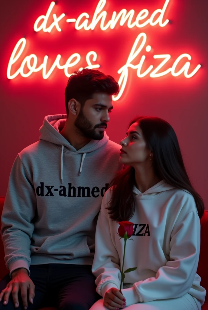 A 8K detailed portrait ultra HD qulaity of a 27 years slim smart, handsome guy from pakistan and a beautiful pakistan's 30-years woman in white hoodies. "Dx-Ahmed" is on his hoodie, "Fiza" on hers. She holds a red rose while sitting, with a neon-lit wall behind them reading "Dx-Ahmed loves Fiza." The mood is romantic and serious.