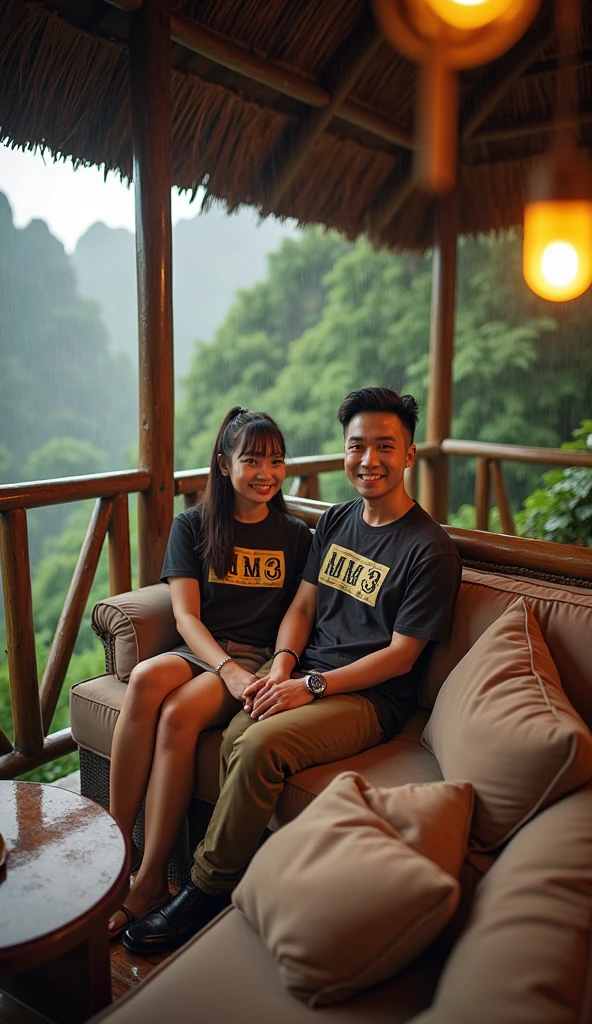 Serene wooden balcony with rustic bamboo railing overlooking lush green forest during heavy rain. The balcony is equipped with a comfortable long sofa with large brown cushions., and a small round table that can accommodate two cups of tea or coffee. A handsome Indonesian man with a clearly visible smiling face and neat short hair sitting on the sofa, wearing a black t-shirt with a vintage logo "m3", celana jeans panjang, and flip flops, bersama seorang wanita cantik Indonesia tersenyum rambut panjang lurus bangs ponnytails tersenyum duduk di sofa mengenakan t-shirt tanpa lengan hitam dengan logo vintage 'm3', white longskirt. They smiled happily looking at the camera . The warm atmosphere is lit with hanging yellow lights, and the natural thatched roof on top adds to the cozy rural atmosphere.. It was night, it was dark all around, adding to the serene and almost mystical atmosphere. In the background, tampak sama samar karena gelapnya. Mist rises between towering cliffs covered in lush green, when it rains., photo, fashion