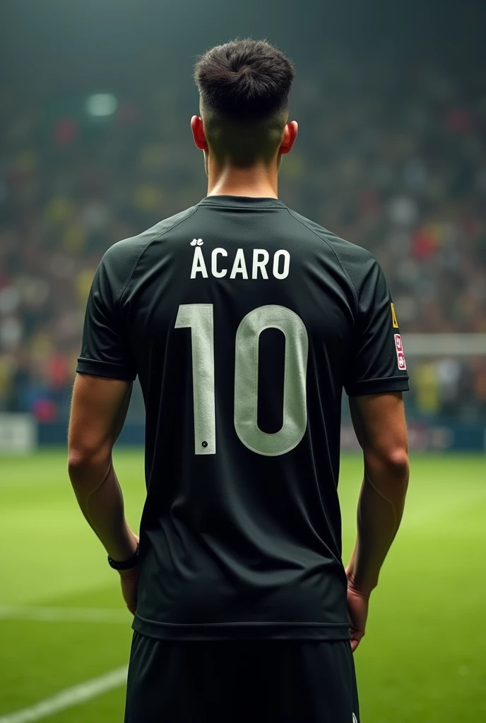 Black football shirt and team on the back with the number 10 written with the name Ícaro