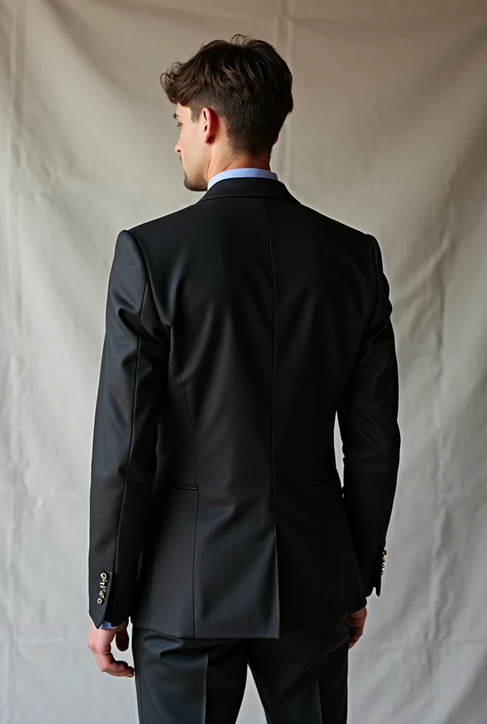 a man in a suit and black dress pants