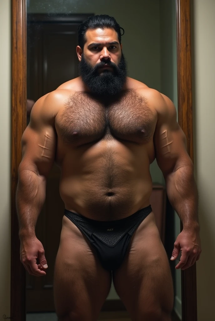 Young Puerto Rican man strong hairy body, very hairy, bearded man in front of the mirror naked naked from the belly down, nakeness, showing hairy groin, pubic-hair, sex-cover, shell only hip showing.