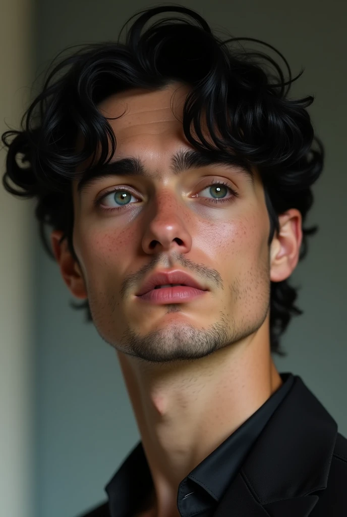 Handsome man with curly black hair, sleepy blue eyes, freckles, fair skin and a long nose