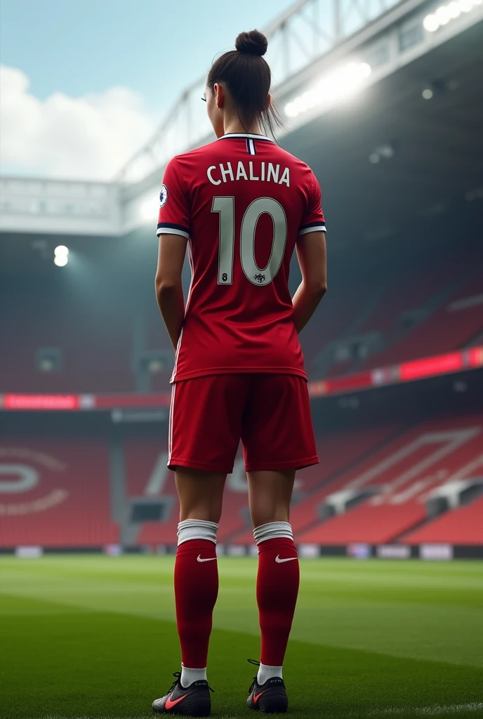 Football player number 10 with the name Chalina on her back at Old Trafford stadium next to Marcus Rashford
