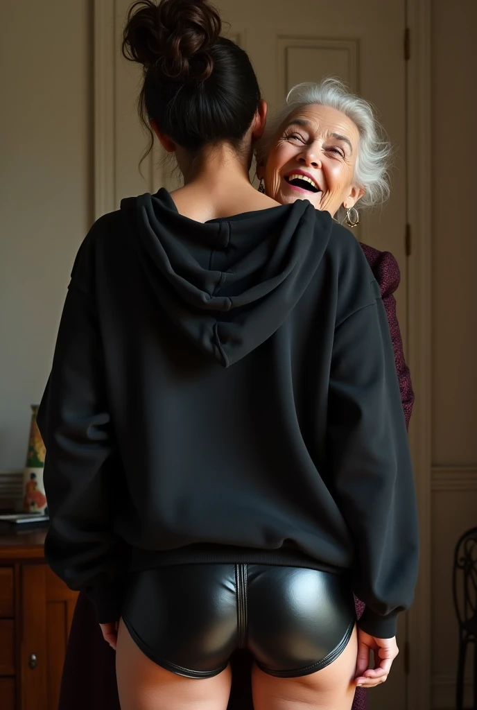 black woman hair in a bun black hoodie black leather short shorts being fucked in the ass by a old grandma in a dress