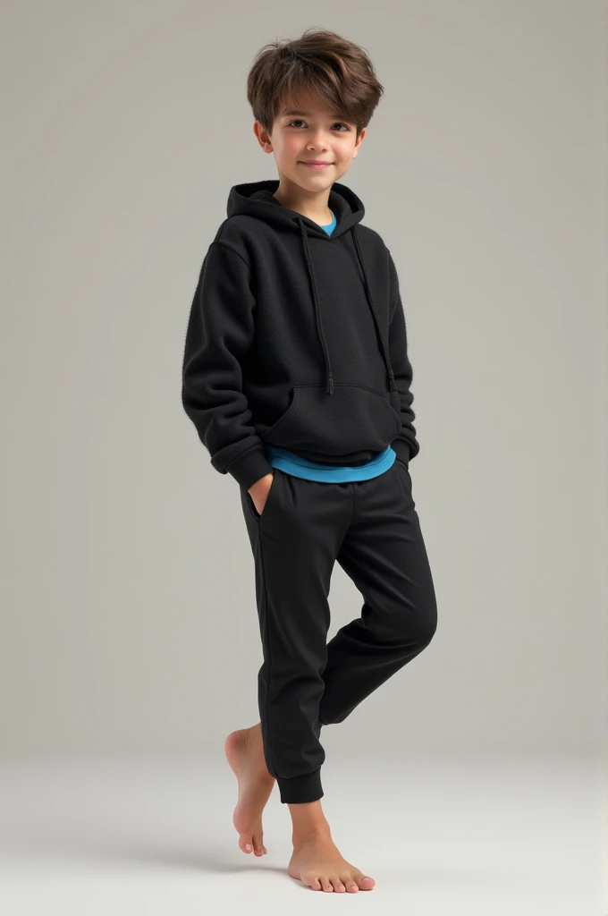 Barefoot boy in black sports pants, Black open-toed sweater and under the sweater he has a blue shirt lifting one foot