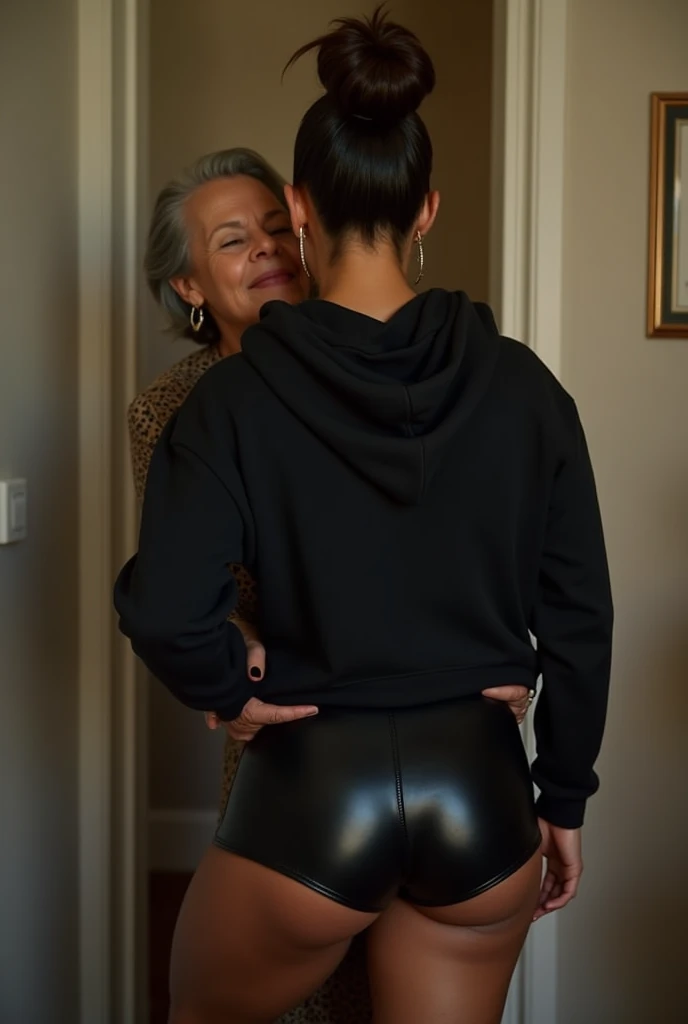 black woman hair in a bun black hoodie black leather short shorts being fucked in the ass by a old grandma in a dress