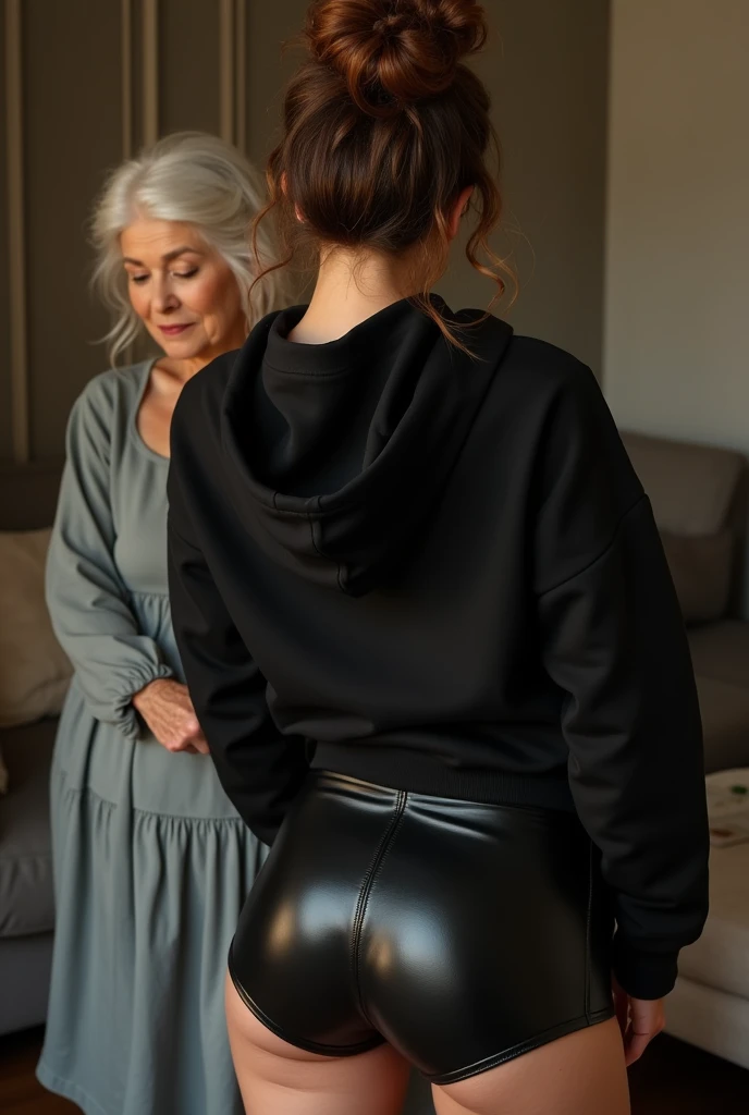 black woman hair in a bun black hoodie black leather short shorts being fucked in the ass by a old grandma in a dress