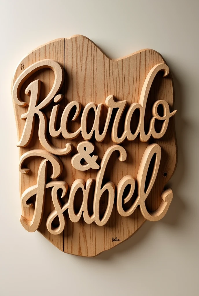 Ricardo and Isabel carved in wood with cursive lettering